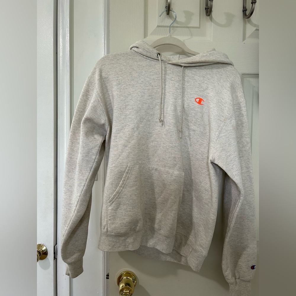 Beige champion hoodie with detailed back